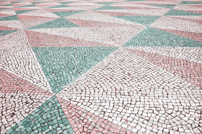 马赛克瓷砖路面背景三角形铺路色调的照片