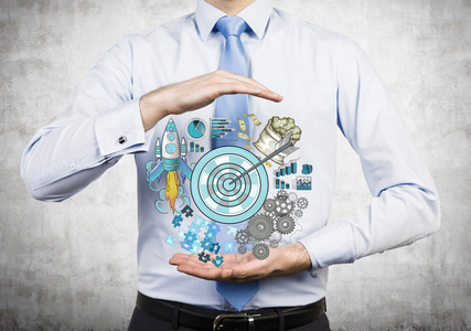 斗图图片钱一个男人好像掌握目标包围的钱,照片图片火箭,图表, 齿轮和