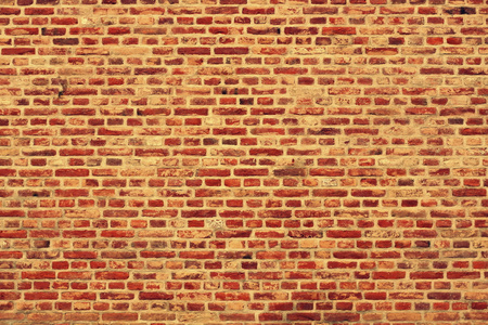 砖砌墙的水平背景用红色，橙色和棕色砖橙色版本