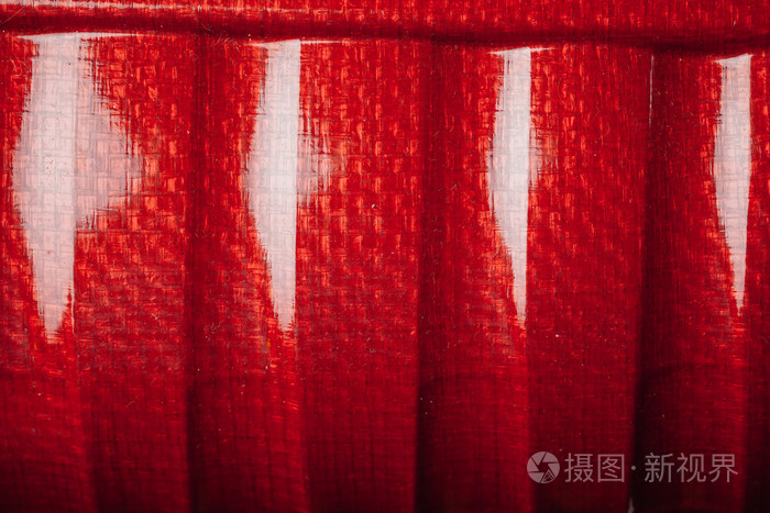 红壳碳纤维背景，特写视图