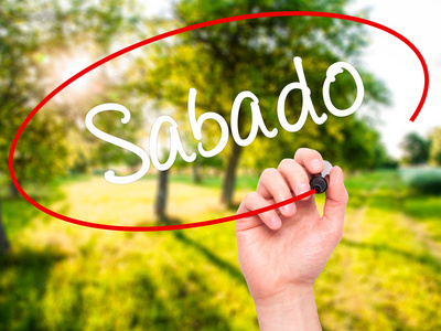 男人的手写作与 bl Sabado 星期六在西班牙葡萄牙