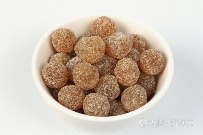 在白色杯甜甜的糖