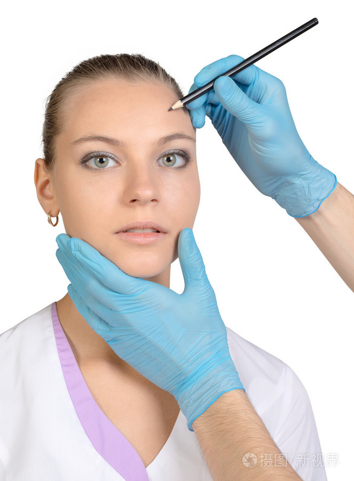 美丽女人脸手术制作标记上的关闭了画像.女模特