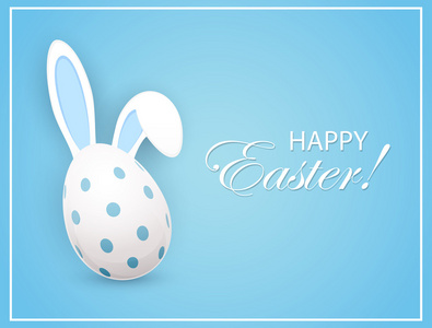 复活节彩蛋在蓝色背景上的兔耳朵
