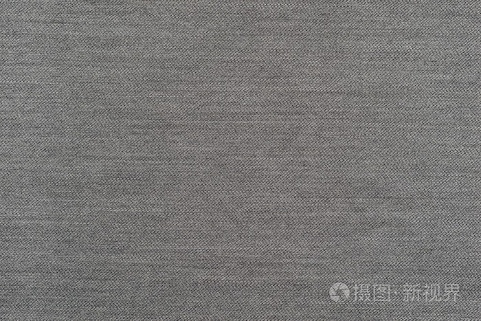 粗糙的纹理牛仔织物单色背景的淡灰色的颜色