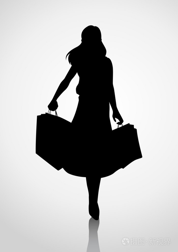 一个女人的身影拎着购物袋的剪影