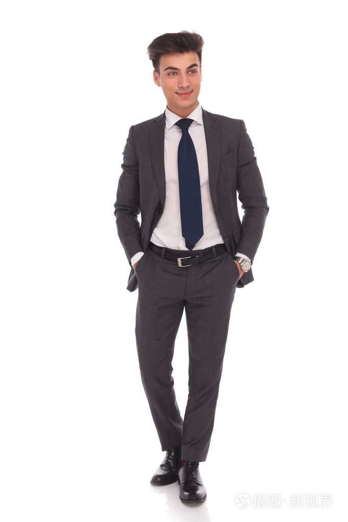 双手插在口袋里站一个商人的一面照片-正版商用图片1mehyu-摄图新视界