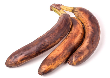 在白色背景前的太熟香蕉照片