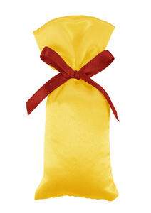 与弓黄色和红色礼品丝袋