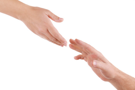 相信在友谊在白色孤立伸出援助之手照片