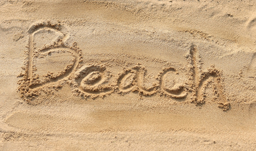 海滩写在沙滩上的沙子