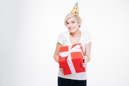 幸福的女人，在党的帽子，拿着礼品盒