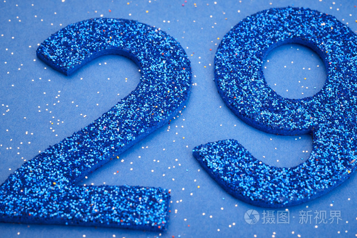 数字二十九蓝色颜色在蓝色的背景周年