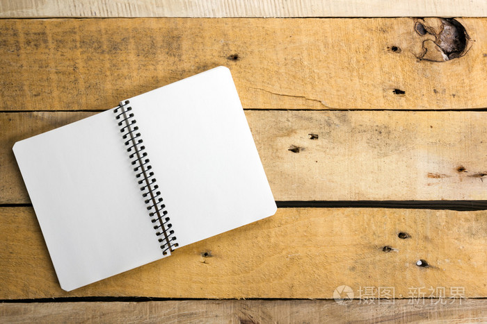 白色的空白纸记事本书在办公室车间复制空间