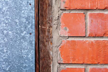 建材 木材质地坚硬 砖 水泥 钣金件的四个要素的组合混合在一起在乡间别墅的墙上。图层复合技术