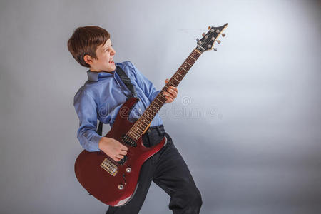 男孩 小孩 运动员 吉他手 岩石 工具 肖像 男人 吉他