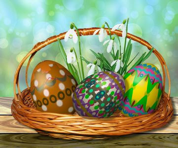 复活节彩蛋与雪花莲的柳条篮子