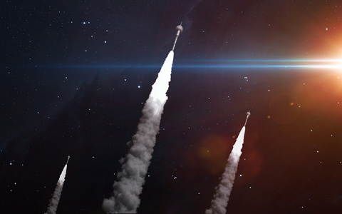 太空中有三枚火箭。 由美国宇航局提供的这幅图像的元素