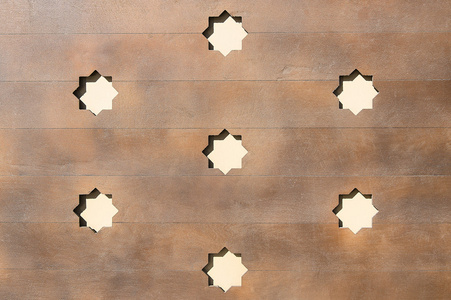 棕色木栅栏背景与星模式