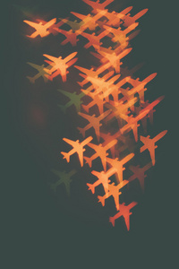 很多橙色飞机在一个黑暗的背景
