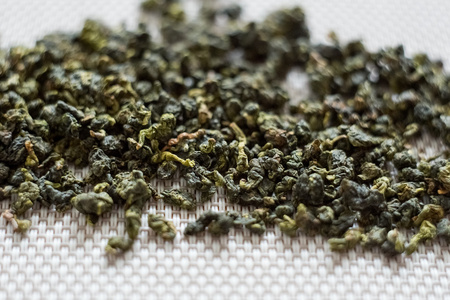 观音叶干绿色乌龙茶铁观音茶叶宏纹理照片