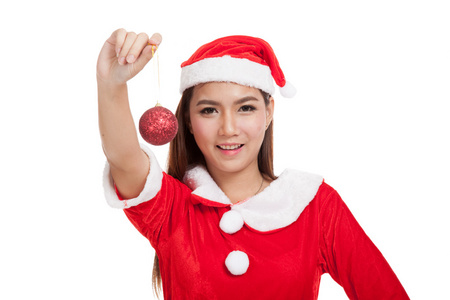 亚洲圣诞女孩与圣诞老人衣服与摆设球