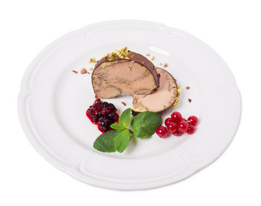 美味鹅杂美味的鹅肝酱,覆盖着黑巧克力照片