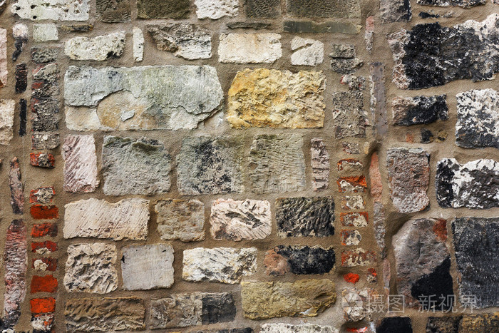 古代的石头墙。建筑带纹理的背景