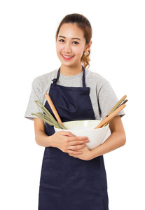亚洲女人做饭上白色孤立的概念