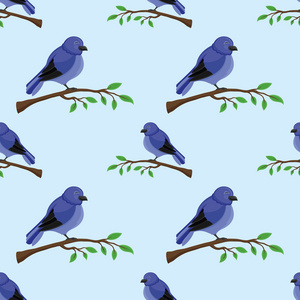蓝色的小鸟坐在树枝上