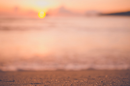 模糊与景太阳光波抽象背景热带日落海滩。旅游概念