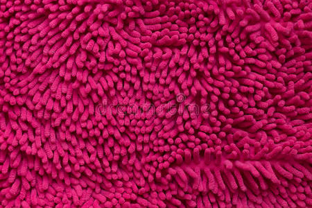 特写粉红色清洁门垫或地毯或抹布纹理