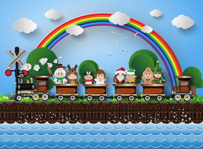 穿着化装的孩子们坐在铁轨上运行的火车上