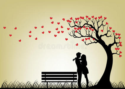 在爱情树下约会情侣的剪影