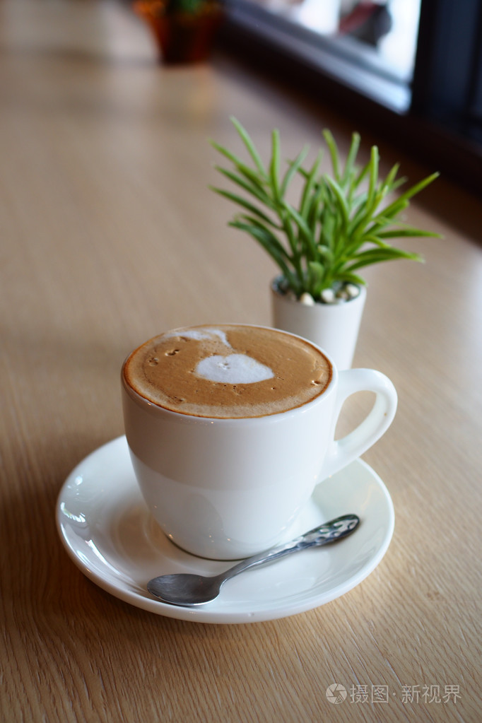 在咖啡厅喝咖啡照片-正版商用图片1obm49-摄图新视界