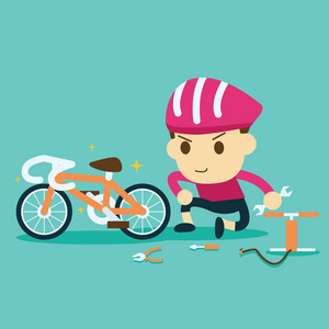 修理自行车的自行车赛车手照片