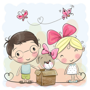 男孩和女孩与可爱的小狗照片