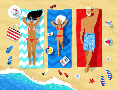 沙滩上的沙滩上的家庭拖鞋家庭躺在海滩上和日光浴照片