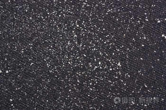 在衣服上的头皮屑的碎片