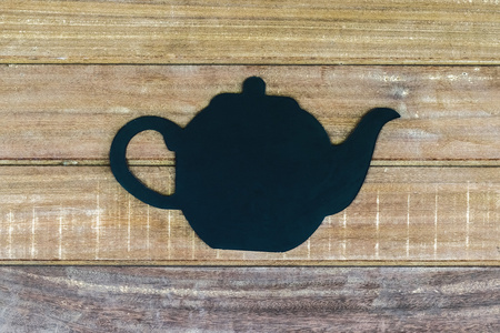 木墙上的茶壶形状图片