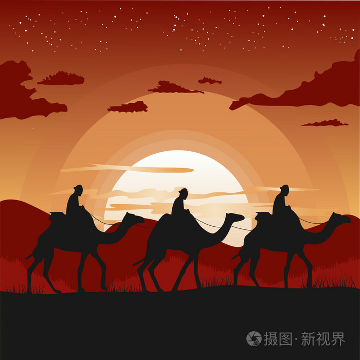 骆驼商队在日落时分在沙漠旅行的剪影