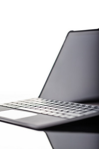 高科技时尚笔记本电脑垂直图片