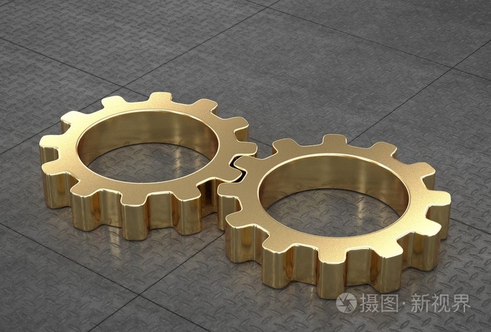 金齿轮连接在反射金属平铺地板上