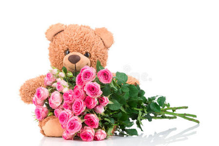 一束玫瑰和一只泰迪熊