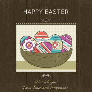 复活节卡片与巢充满彩色鸡蛋在木制背景。