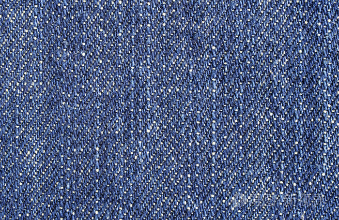 牛仔裤的背景.蓝色牛仔面料肌理关闭