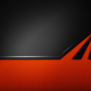 橙色和黑色碳纤维背景照片