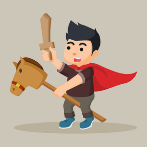 竹马男孩骑竹马和控股木剑照片