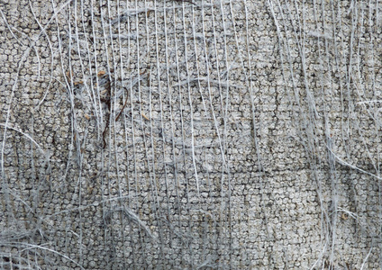 灰面与撕裂的线程照片