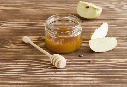 蜂蜜和蜂蜜沾苹果切片图片